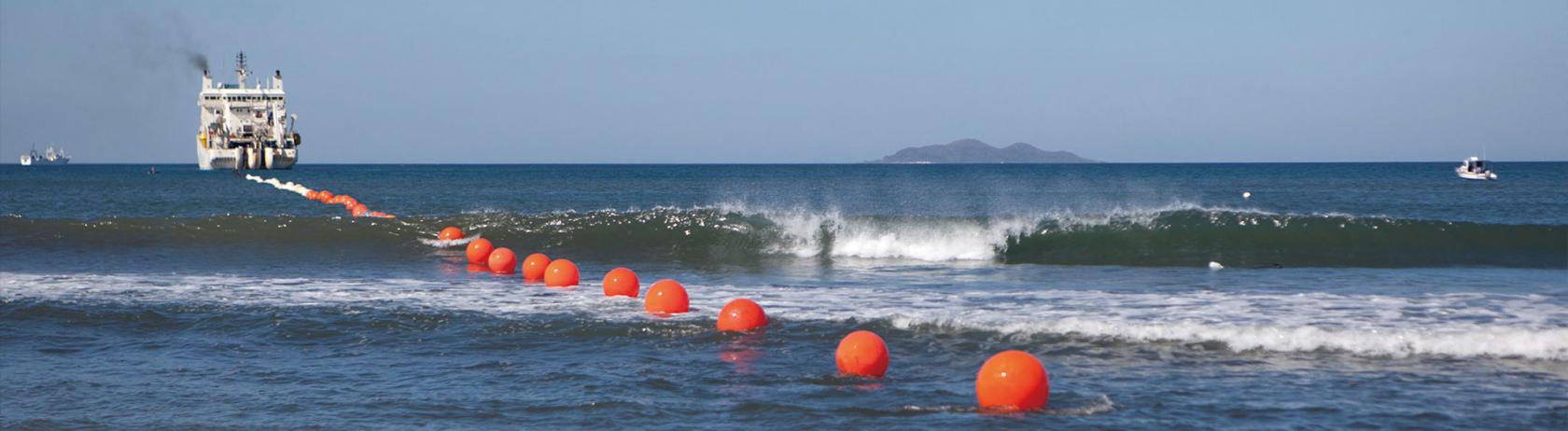 Laying of submarine cable (photo providers: Japan electric co., LTD)