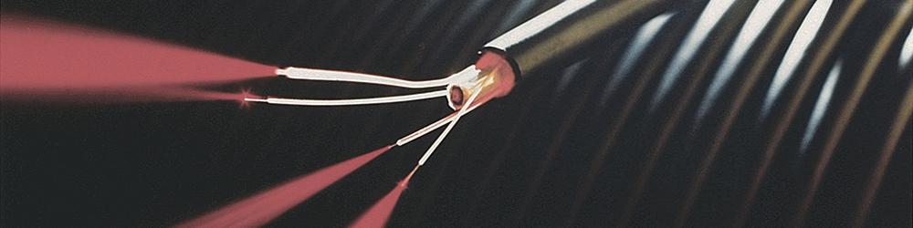 1974 began manufacturing optical fiber cable