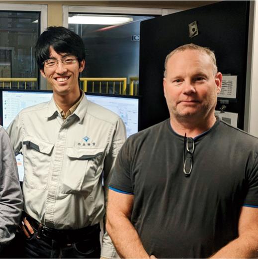 Its Refining LLC Management Lab, west the male insert/and factory director (right) had a group photo taken