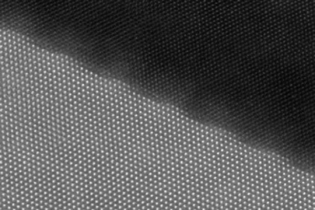Type by scanning transmission electron microscopy to crystal interface atomic image tool material.Take the distortion in the interface