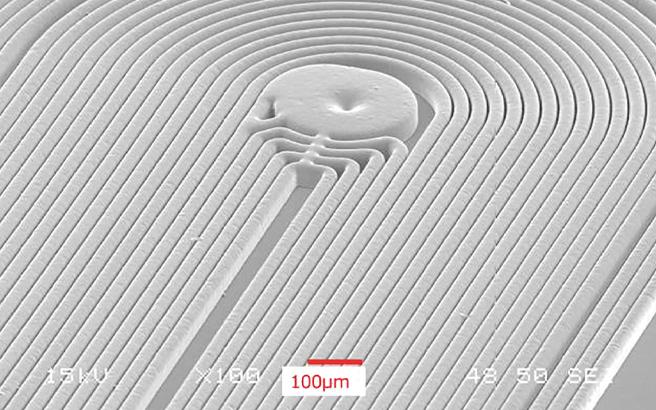 Observed by scanning electron microscope (sem) actuator coil
