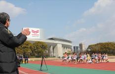 Cheering for the athletes as they started the race